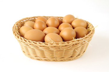 Fresh organic farm eggs on handbasket