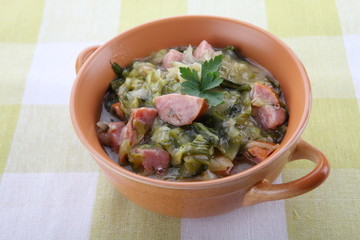 Traditional polish sauerkraut (bigos) with sausages