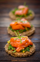 Canapes with smoked salmon and herbs