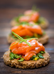 Canapes with smoked salmon and herbs