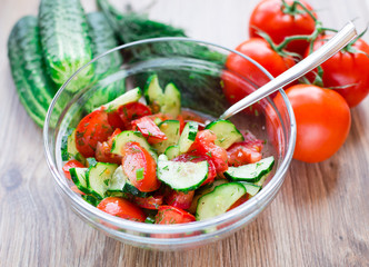 Tomato salad with cucumber and onion