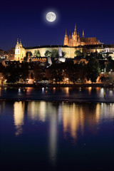 Night Prague gothic Castle with the Moon Czech Republic