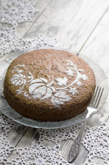 Pumpkin cake on glass plate whith fork