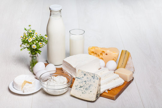 milk and food on wooden background