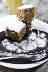 Pumpkin cake on black plate
