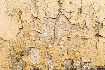 Cracked yellow concrete surface