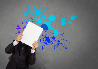 businessman with blank book and splash colors choice