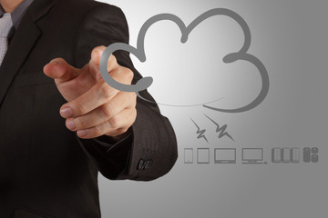 Businessman working with a Cloud Computing diagram on the new co