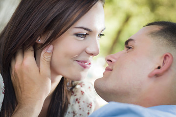 Mixed Race Romantic Couple Portrait in the Park