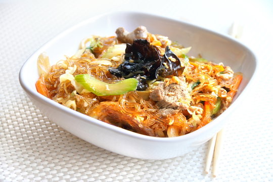 Spicy glass noodles with beef, vegetables and eggs