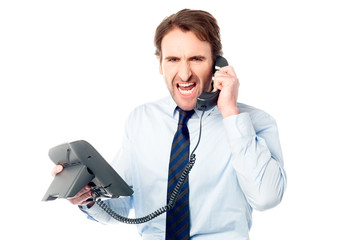 Angry business professional yelling