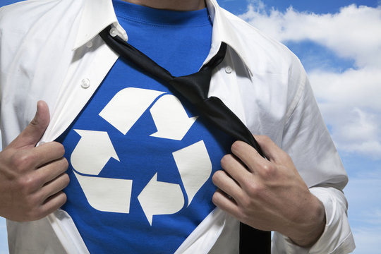 Businessman with open short revealing shirt with recycling symbol underneath