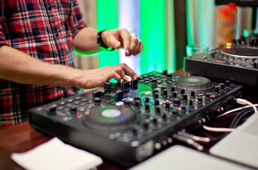 Dj mixing in night club