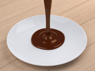 Chocolate flow on white plate