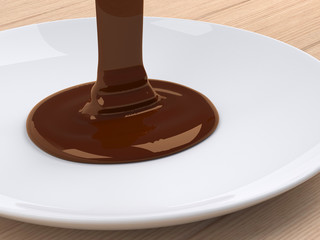 Chocolate flow on white plate