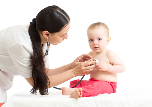 doctor examining baby girl isolated on white background