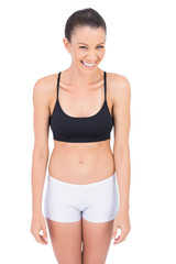Fototapeta premium Smiling fit athlete posing