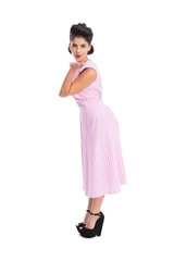 Beautiful woman sending a kiss to camera