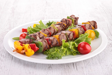 pieces of meat with vegetables