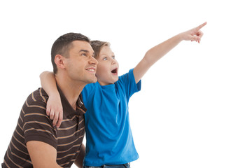 Father and son. Cheerful father and son standing close to each o