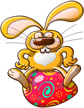 Easter rabbit proud of his big egg and seated on it