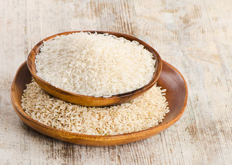 Rice in bowl on a wooden table