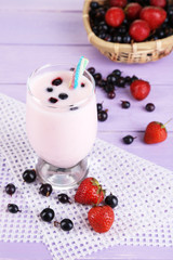 Delicious milk shake with blackberry and strawberries