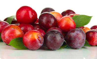 Ripe plums isolated on white