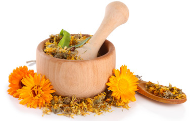 Fresh and dried calendula flowers in wooden mortar  isolated - obrazy, fototapety, plakaty