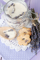 Jar of lavender sugar and fresh lavender flowers