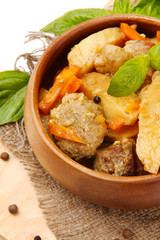 Homemade beef stir fry with vegetables in color bowl,