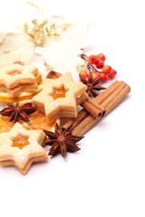 Fototapeta na wymiar Dry orange slices, spices and Christmas cookies