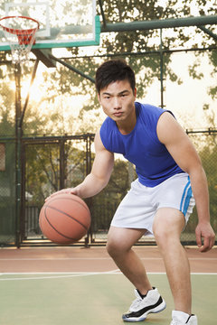 Street basketball player on the court, portrait