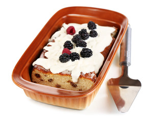 Cheese casserole with raisins in pan isolated on white