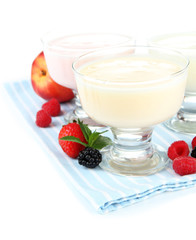 Delicious yogurt with fruit and  berries isolated on white
