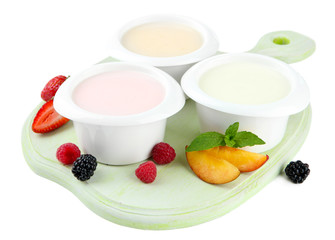 Delicious yogurt with fruit and  berries isolated on white