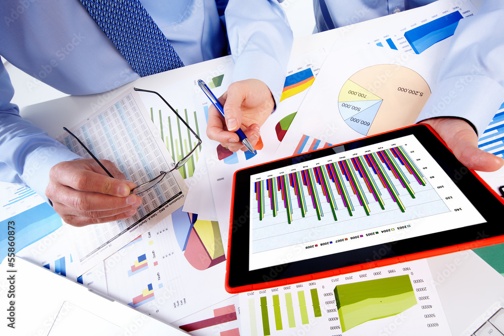 Aufkleber business team working with tablet computer.