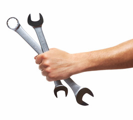Hand of auto mechanic with wrench.