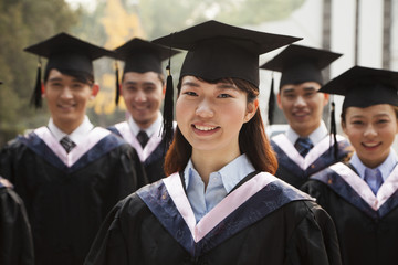 Young Graduates in Cap and Gown