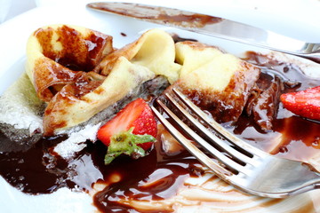 pancakes with chocolate and strawberries