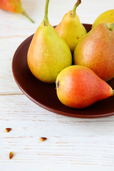 fresh and juicy pears on a platter