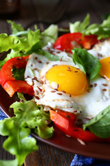 eggs with vegetables on the plate