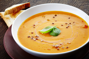 squash soup with basil leaf