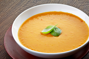 squash soup with basil leaf