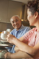 Senior couple sharing tea