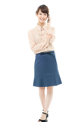 Beautiful asian business woman using a cellular