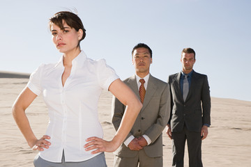 Businesspeople in desert