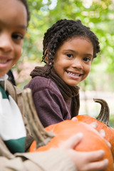 Fototapeta premium Kids with pumpkins