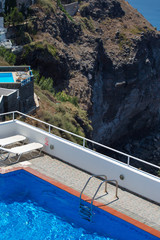 Swimming pools and hotels on the Caldera in Santorini,