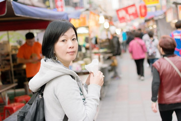 Mature Asian women at street